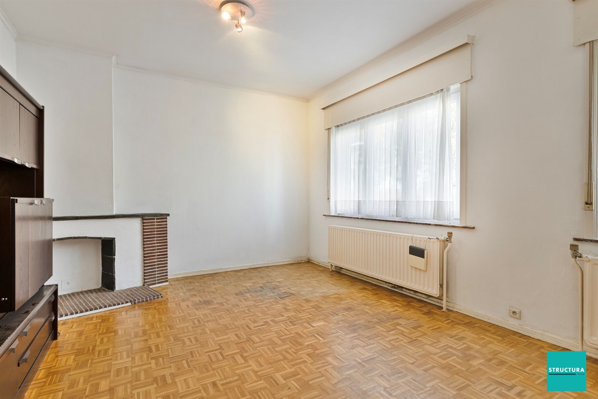 Opbrengsteigendom met 2 appartementen en 7 garageboxen foto 16
