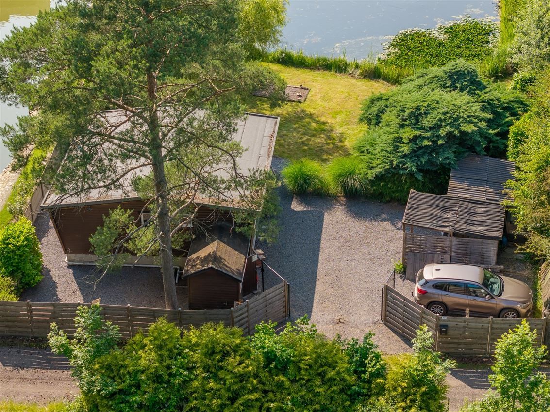 Knusse chalet op 15 are in bosrijk Herselt met vijver, terras en carport. Ideaal vakantieverblijf in het groen. foto 8