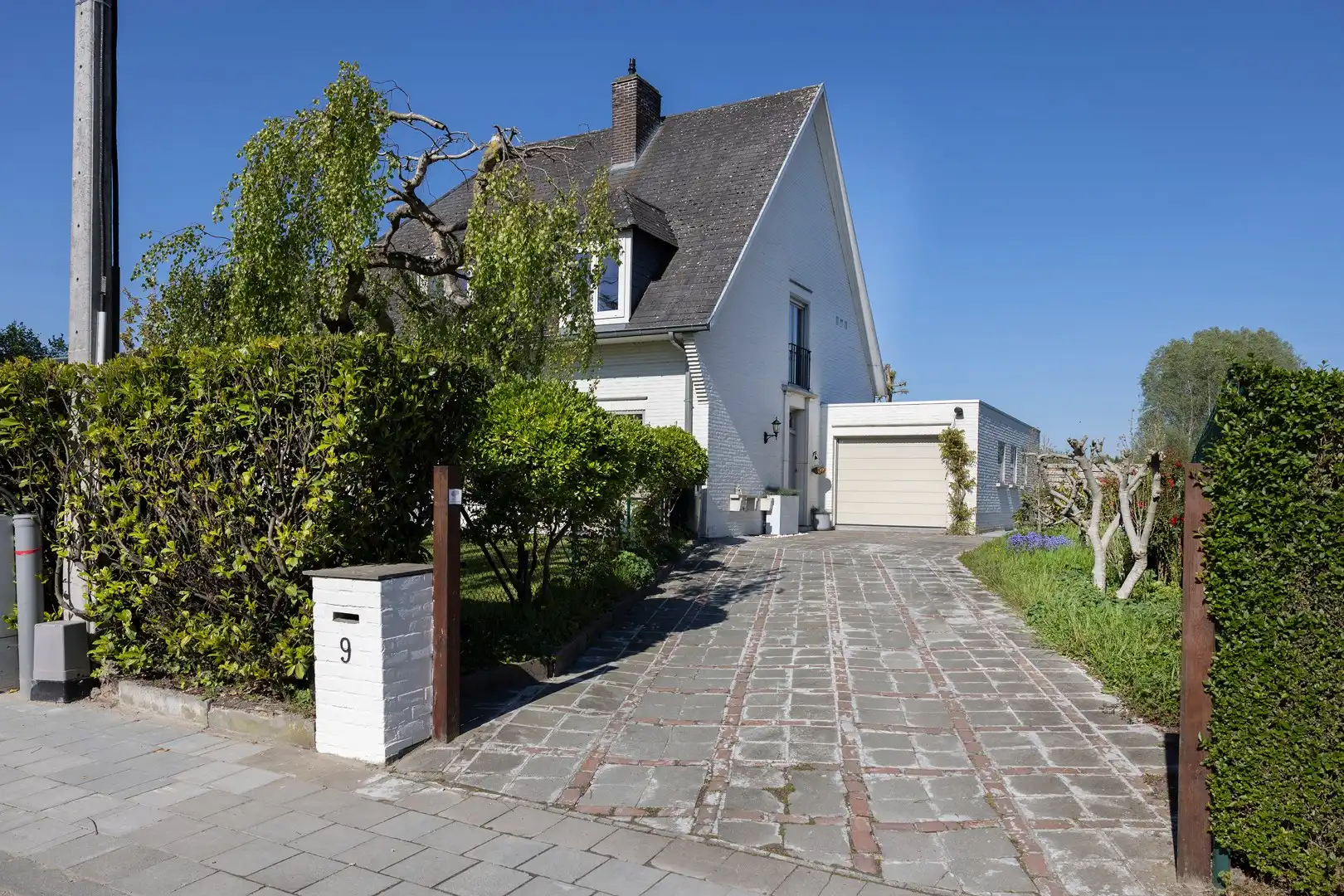 Ruime alleenstaande woning met grote tuin en veel privacy. foto 20
