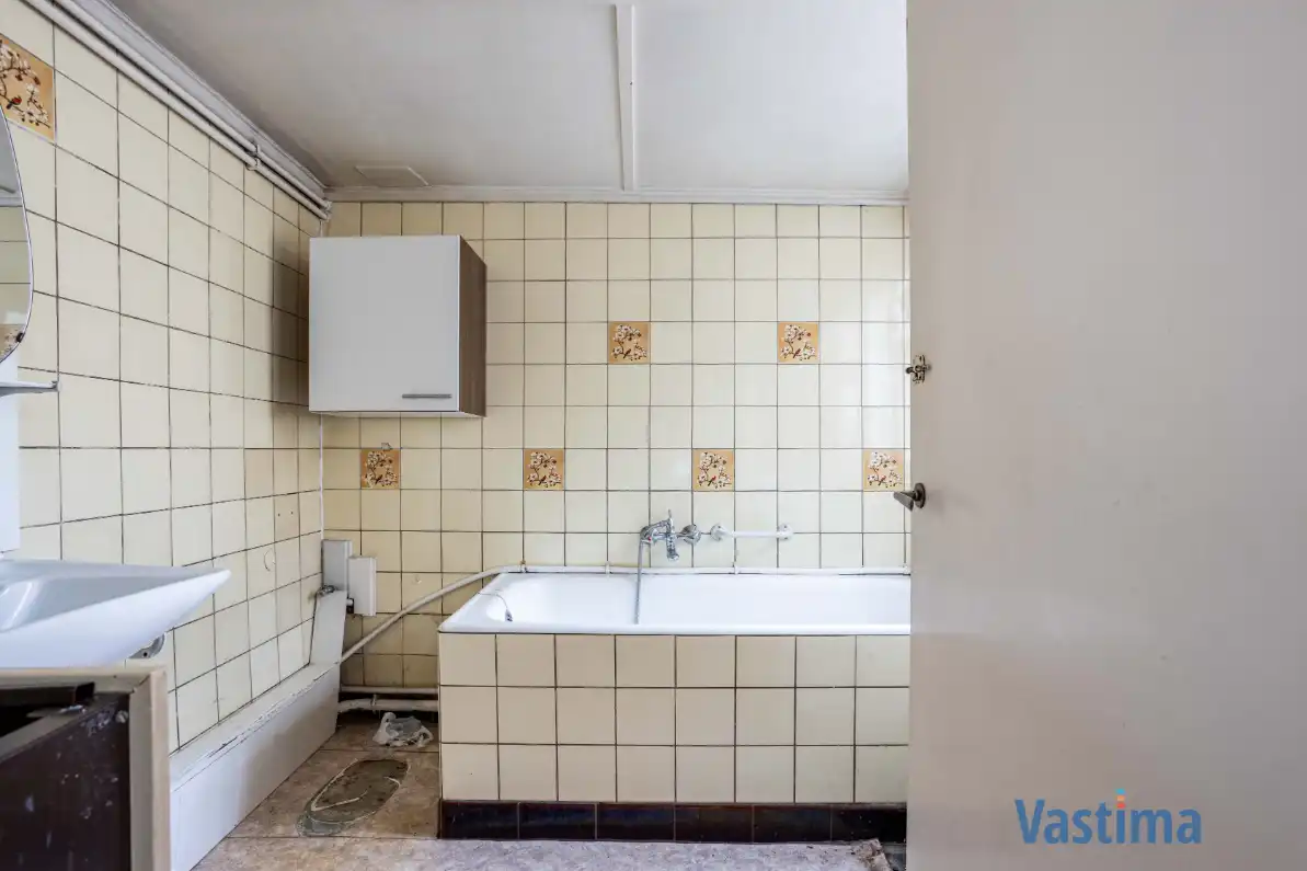 Te renoveren woning met tuin nabij OLV-Ziekenhuis foto 12
