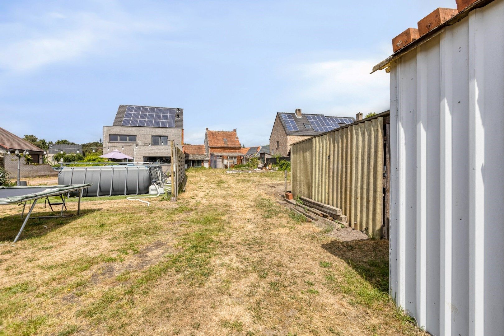Bouwgrond van 674m² met af te  breken woning in een doodlopende straat te Ginderbuiten ! foto 5