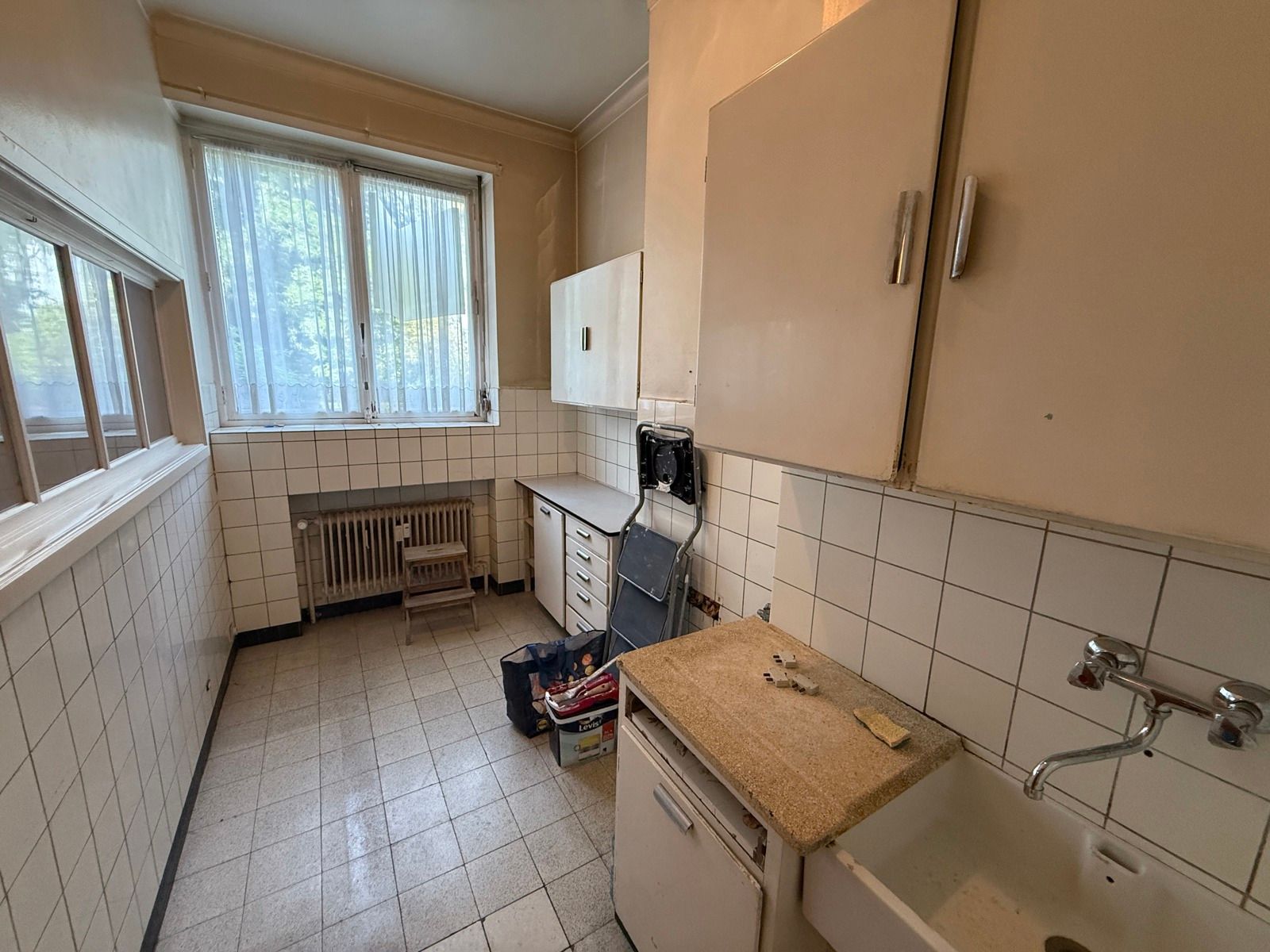 Te renoveren gelijkvloers appartement met 2 slaapkamers foto 7