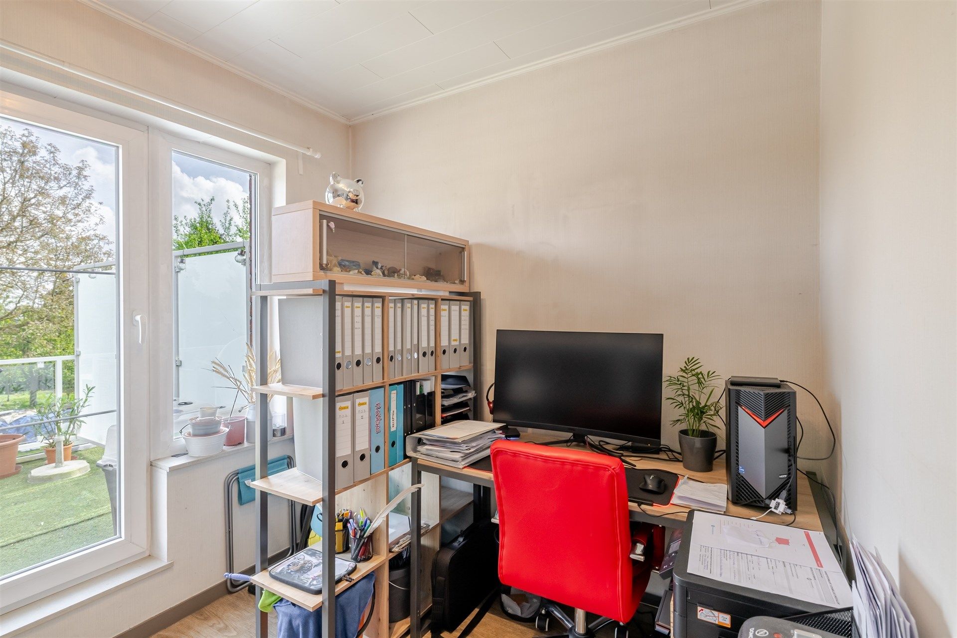 Topinvestering van 2 appartementen met tuin, garage en zolder foto 24