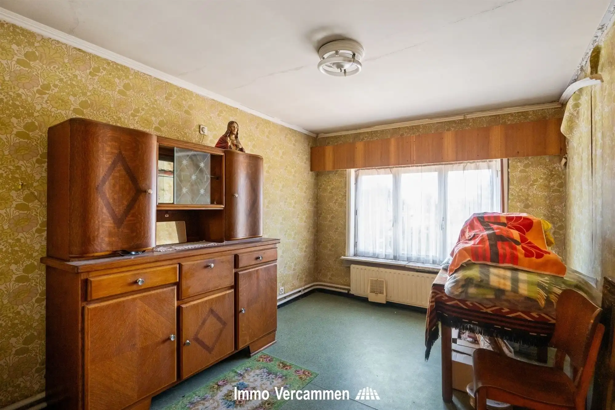 Te renoveren woning met commerciële ruimte in Schriek foto 10