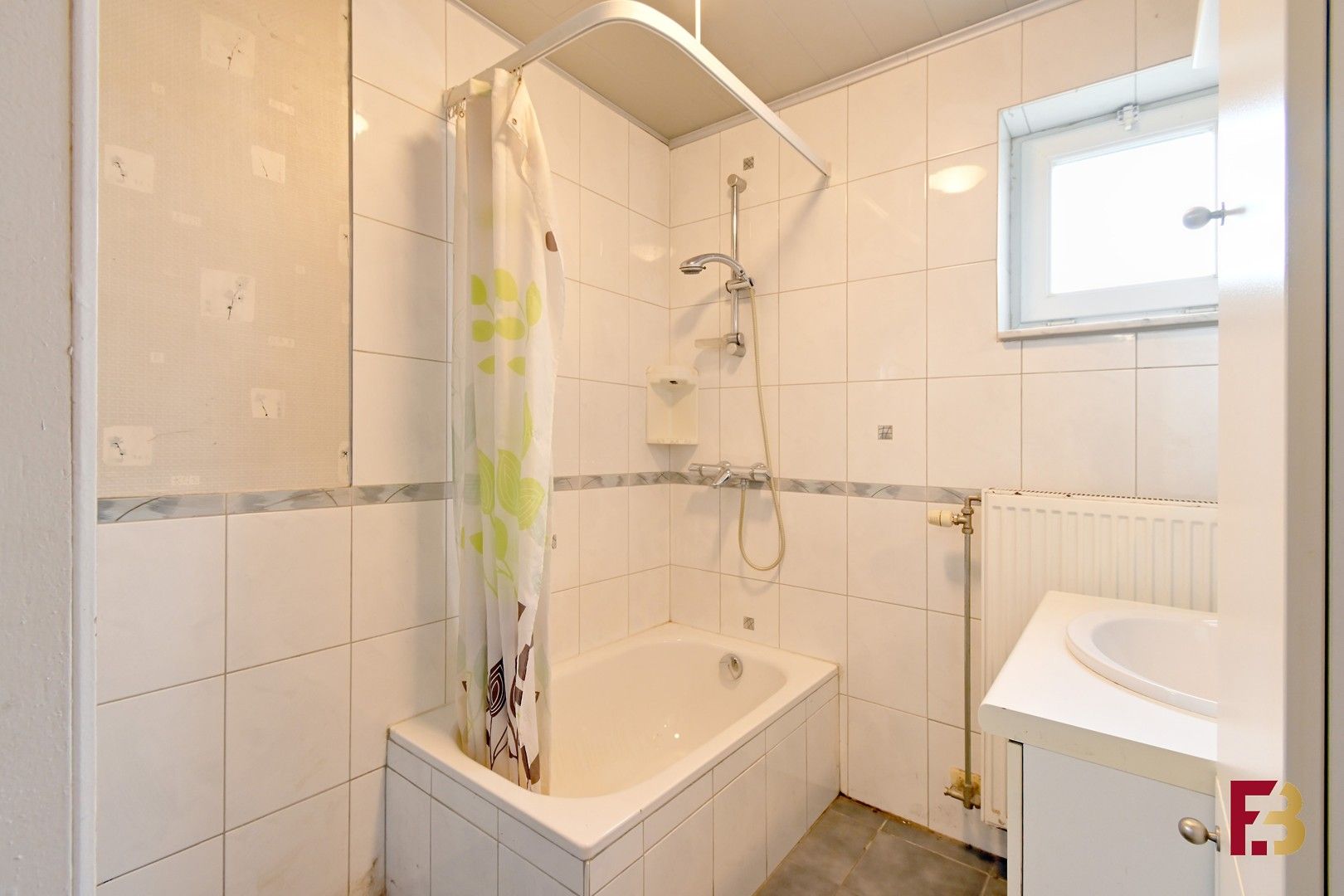 Woning met potentieel, garage en oprit in Zwijnaarde (geen renovatieplicht!) foto 9