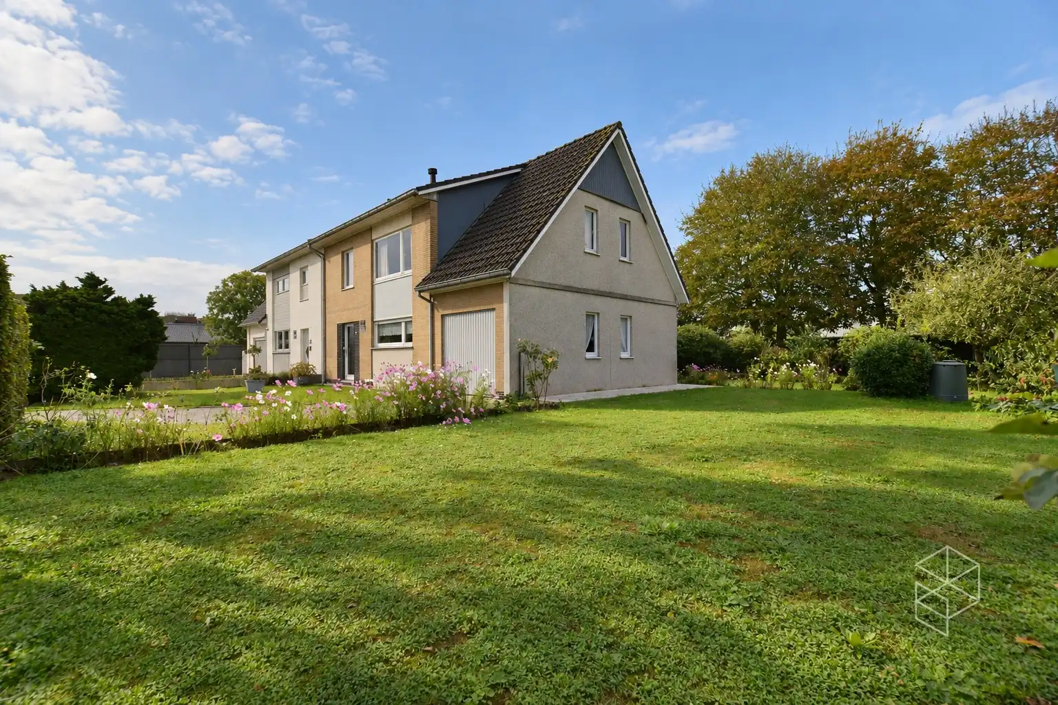 Zeer goed onderhouden gezinswoning met 4 slaapkamers en zonnige tuin foto 2