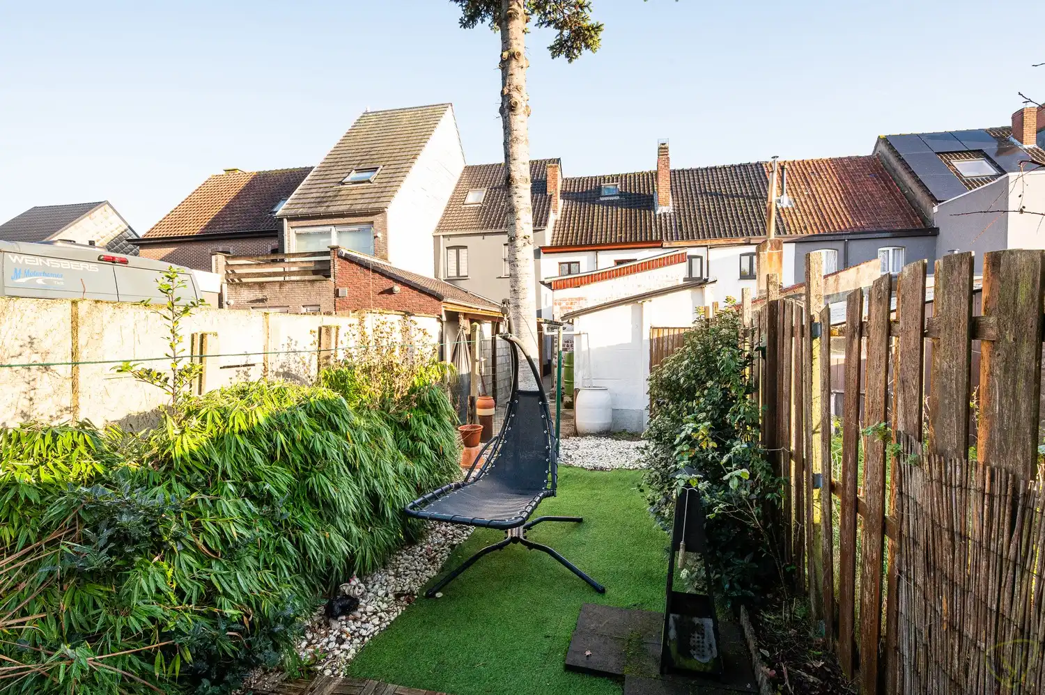 Charmante gesloten bebouwing met ruime tuin en renovatiepotentieel foto 25