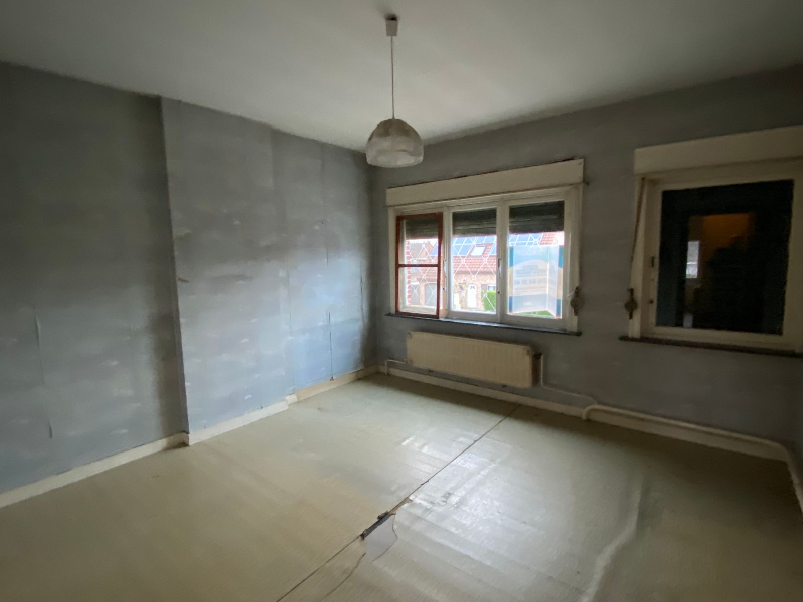 Zeer goed gelegen te renoveren woning foto 10