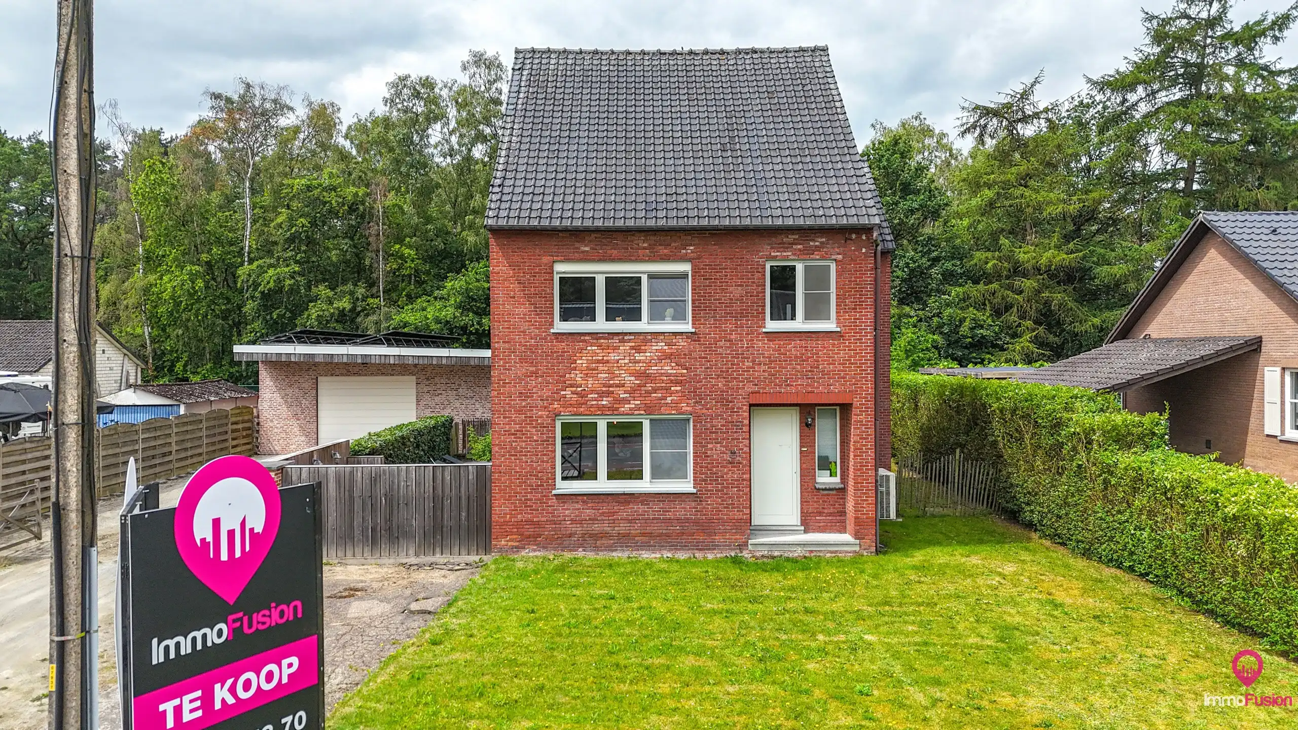Woning met werkplaats van 125m², tuin en EPC B te Koersel! foto 37