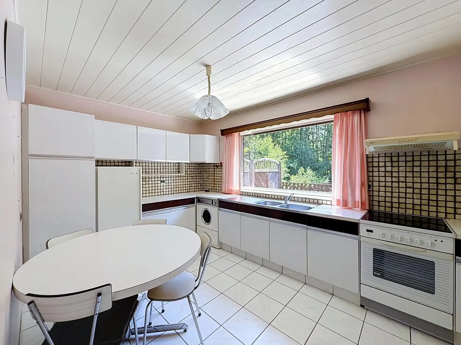 Op te knappen woning met veel mogelijkheden op een mooi perceel. foto 11
