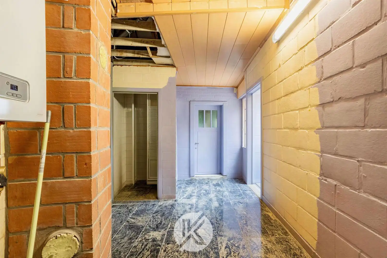 Centraal gelegen woning op een perceel van 10 are foto 22