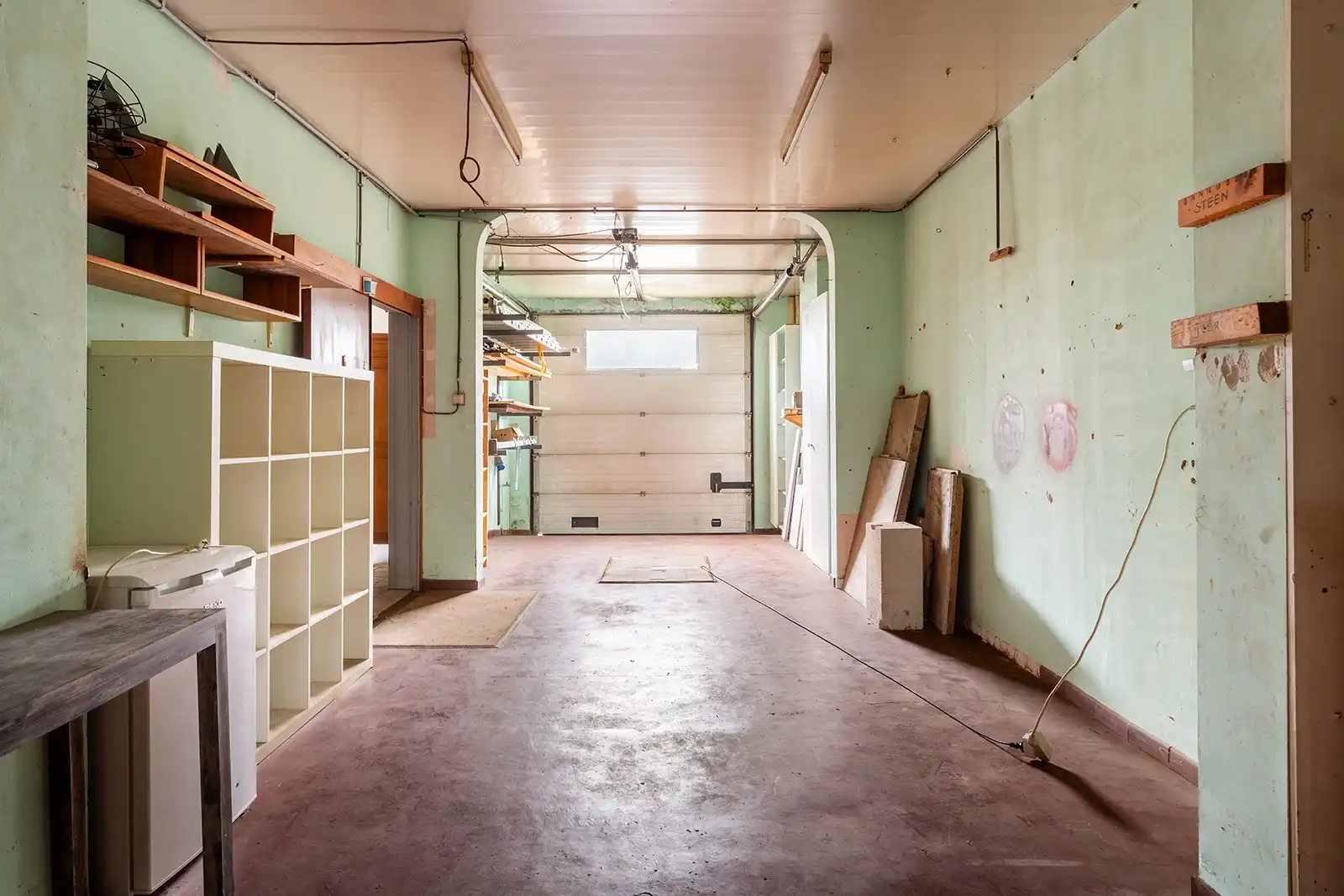 Lichtrijke bel-etagewoning met dubbele garage en ruime tuin foto 5