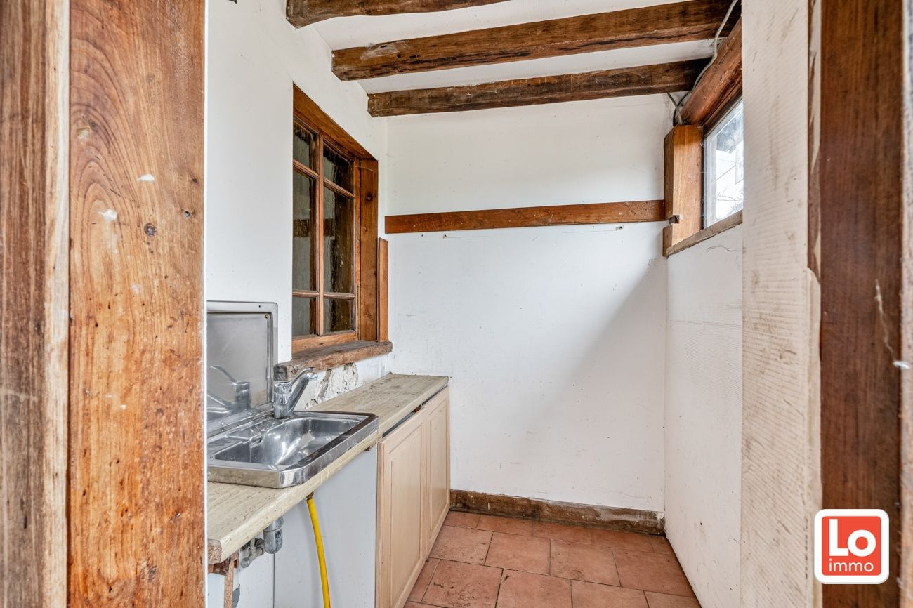 VERKOCHT!! Ruime alleenstaande volledig te renoveren woning met afzonderlijke garage op een makkelijk bereikbare locatie in Desteldonk. foto 26