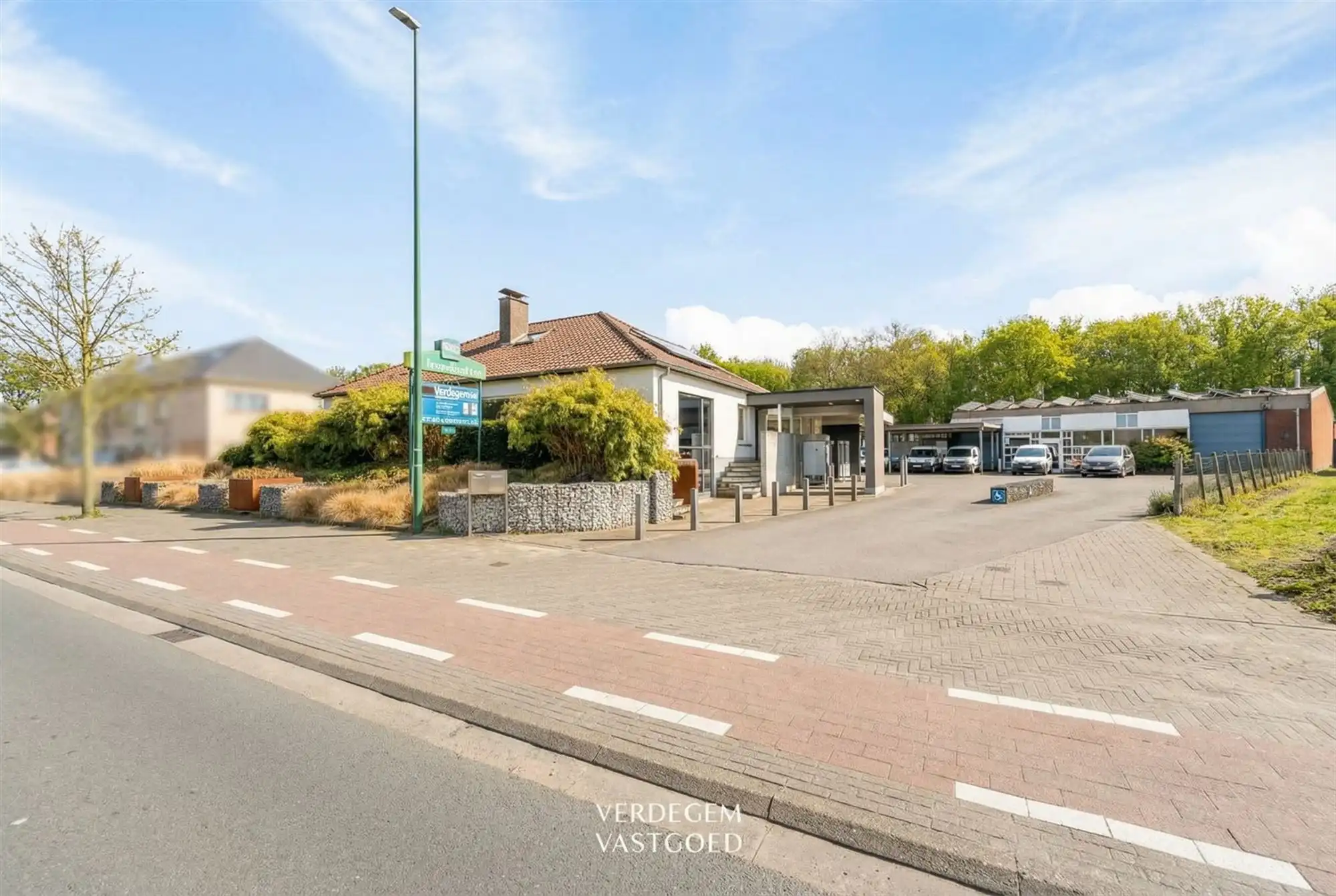 Unieke woon / werkopportuniteit: villa met magazijn van 395m² op toplocatie foto {{pictureIndex}}