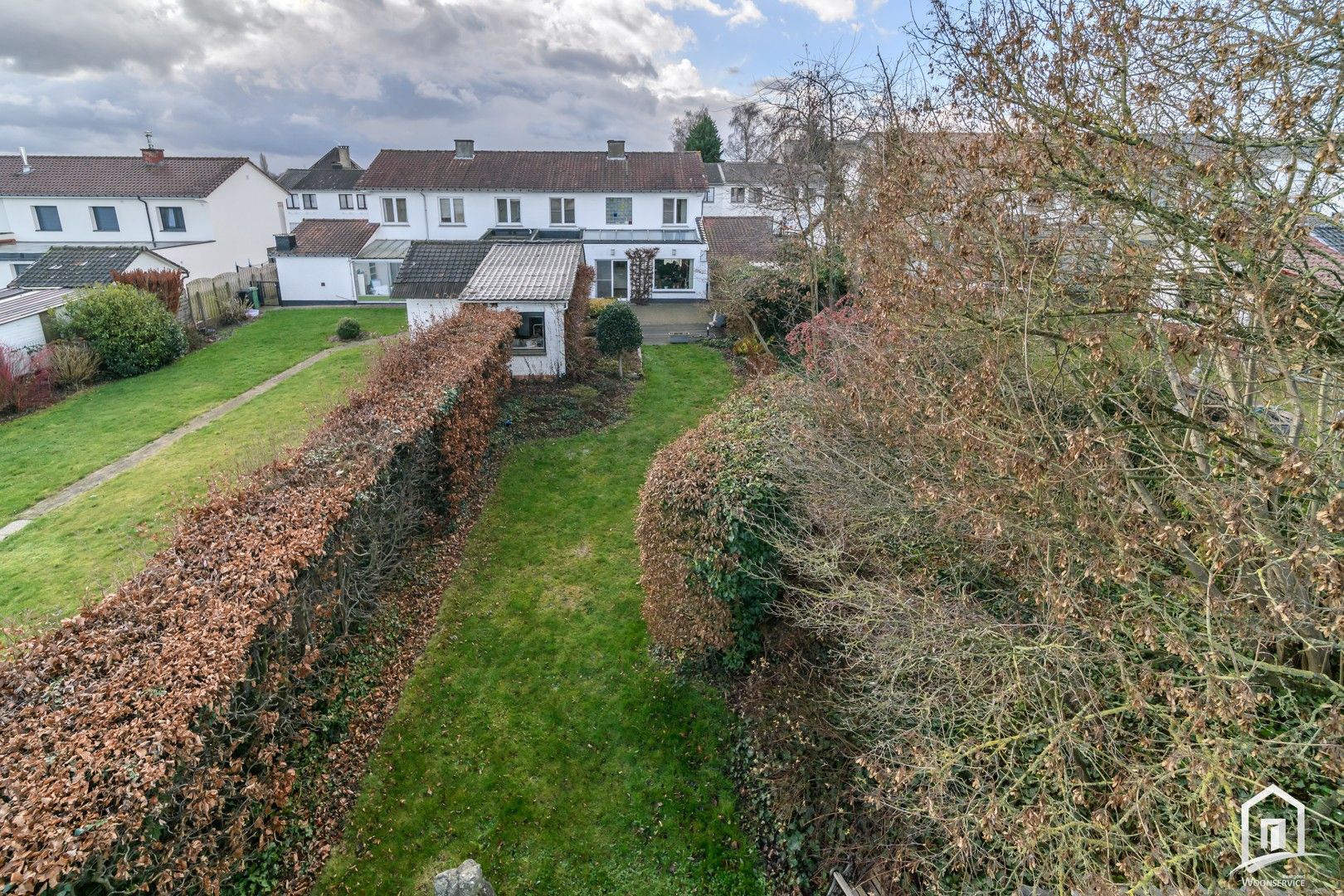 Instapklare halfopen bebouwing met tuin en garages in Denderleeuw foto 36