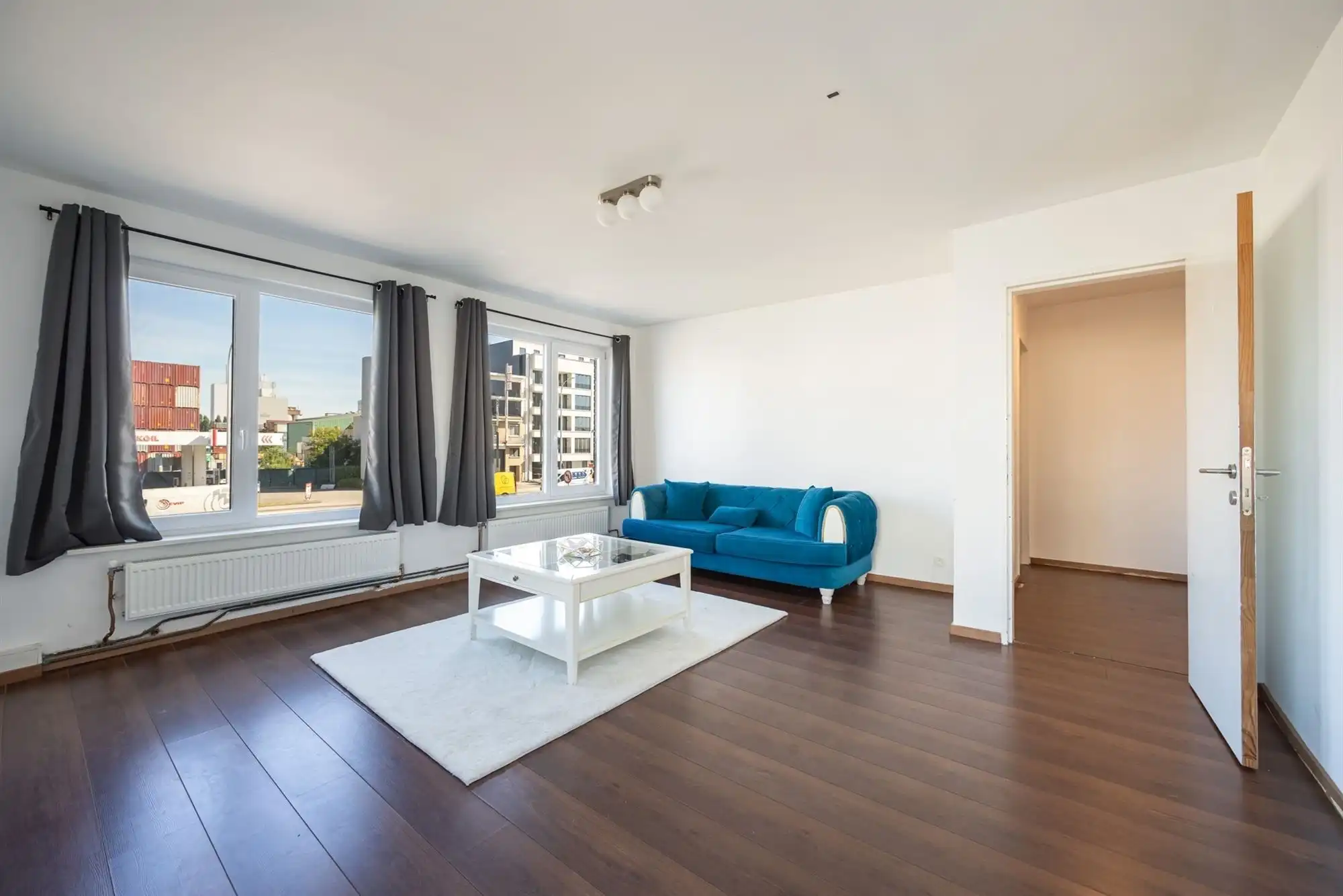 Lichtrijk hoekappartement met 1 slaapkamer foto 2