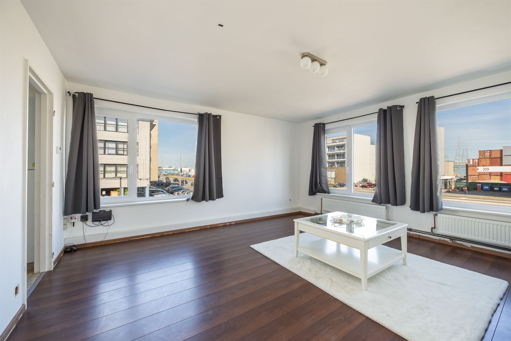 Lichtrijk hoekappartement met 1 slaapkamer foto 2