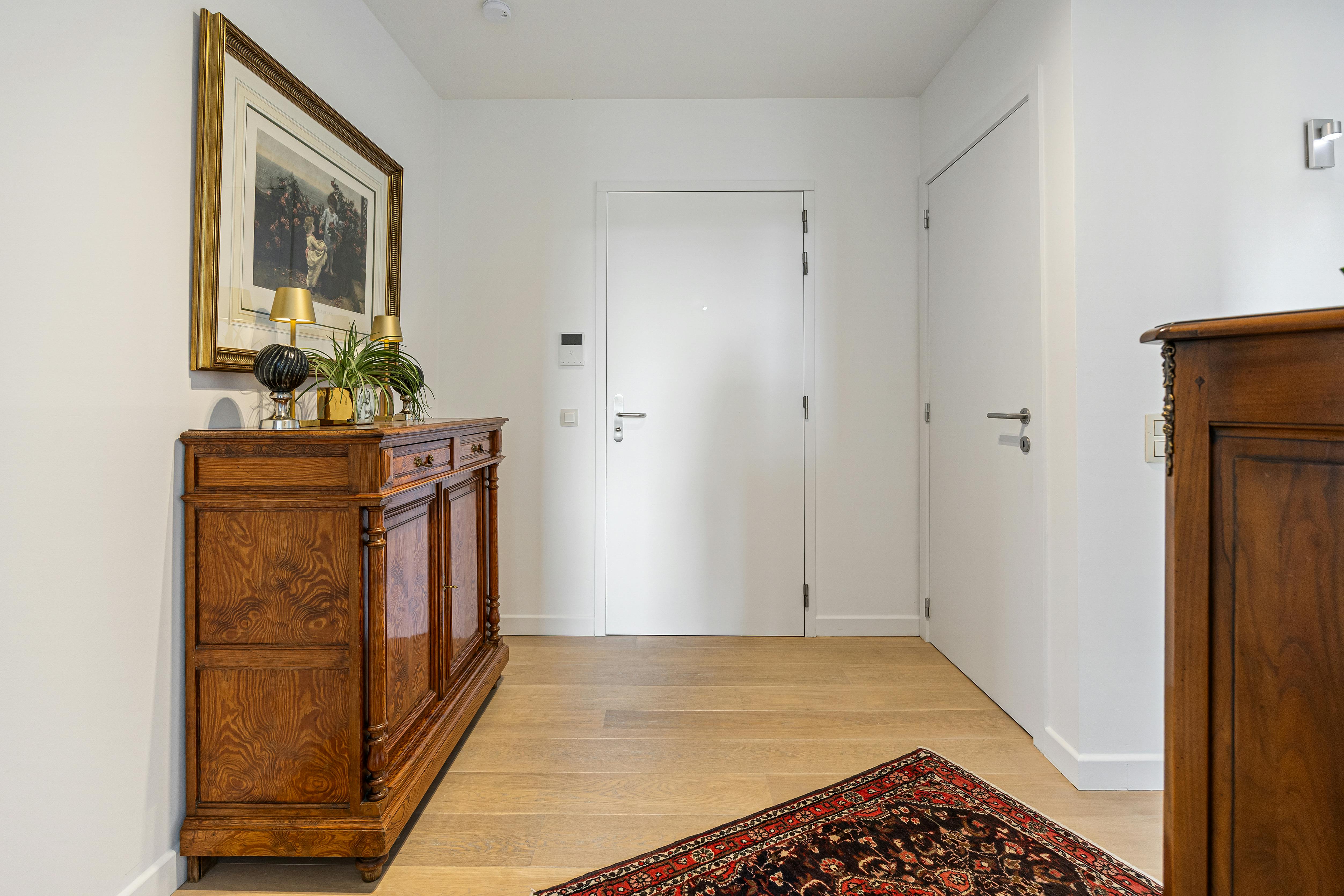 Exclusief hoekappartement aan het water met ruim zonneterras foto 16
