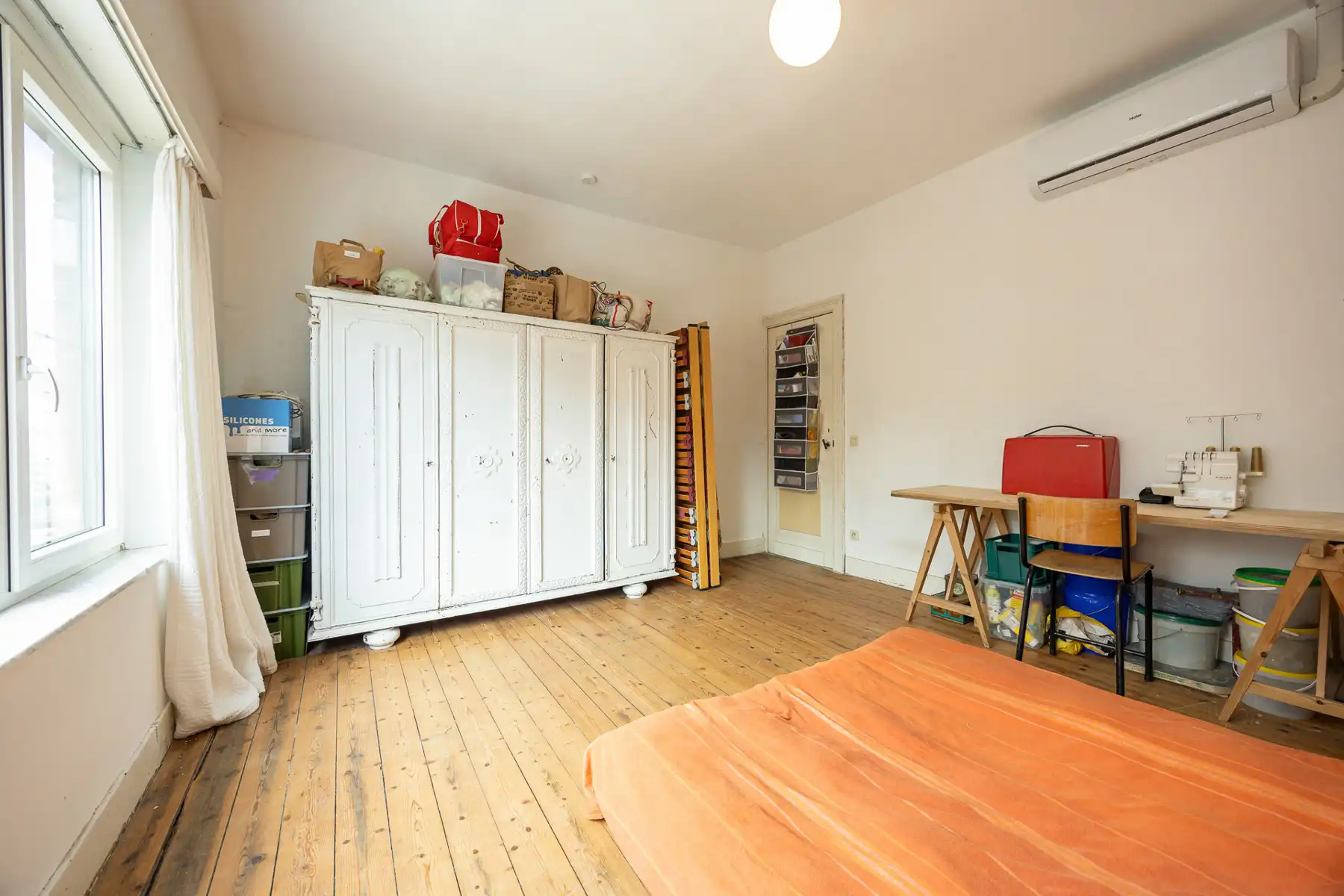 Stadswoning op een perceel van 230 m² met toegang achteraan de tuin. foto 13