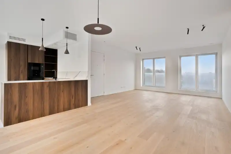 Instapklaar nieuwbouwappartement te huur in hartje Eeklo! foto 10