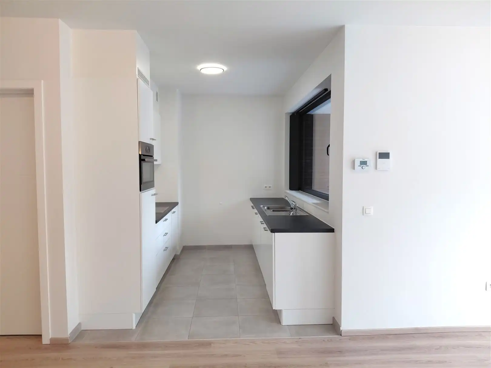 TE HUUR: Gelijkvloers appartement met 2 slaapkamers te Heusden!  foto 7