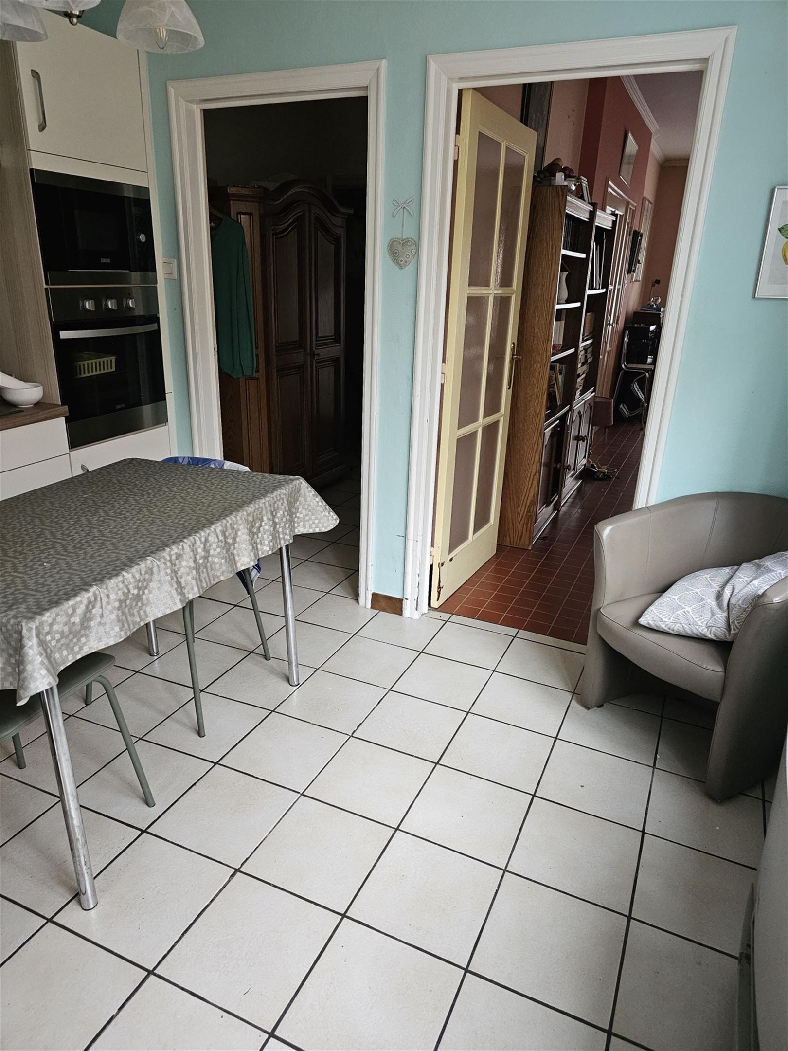 Te renoveren rijwoning op topligging nabij het park van Rozebroeken. foto 6