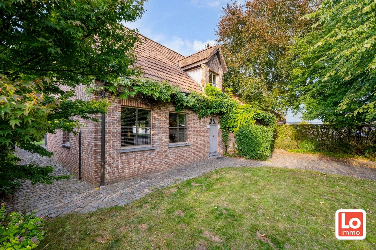 Charmante alleenstaande woning met inpandige garage en grote tuin op een rustige, groene locatie nabij het centrum van Beervelde! foto 28