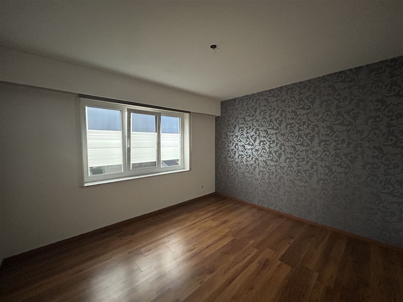 Ruim appartement met 3 slaapkamers en garagebox, gelegen in een rustige, kindvriendelijke omgeving. foto 3