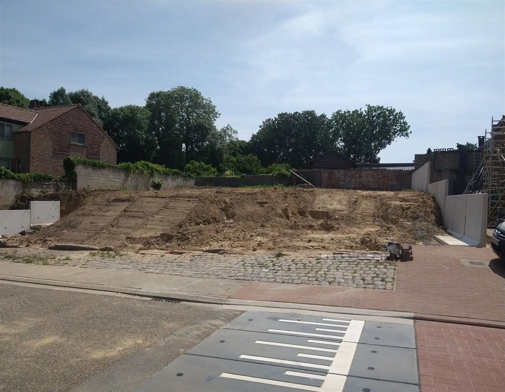 Bouwgrond HOB dorpscentrum Montenaken foto {{pictureIndex}}
