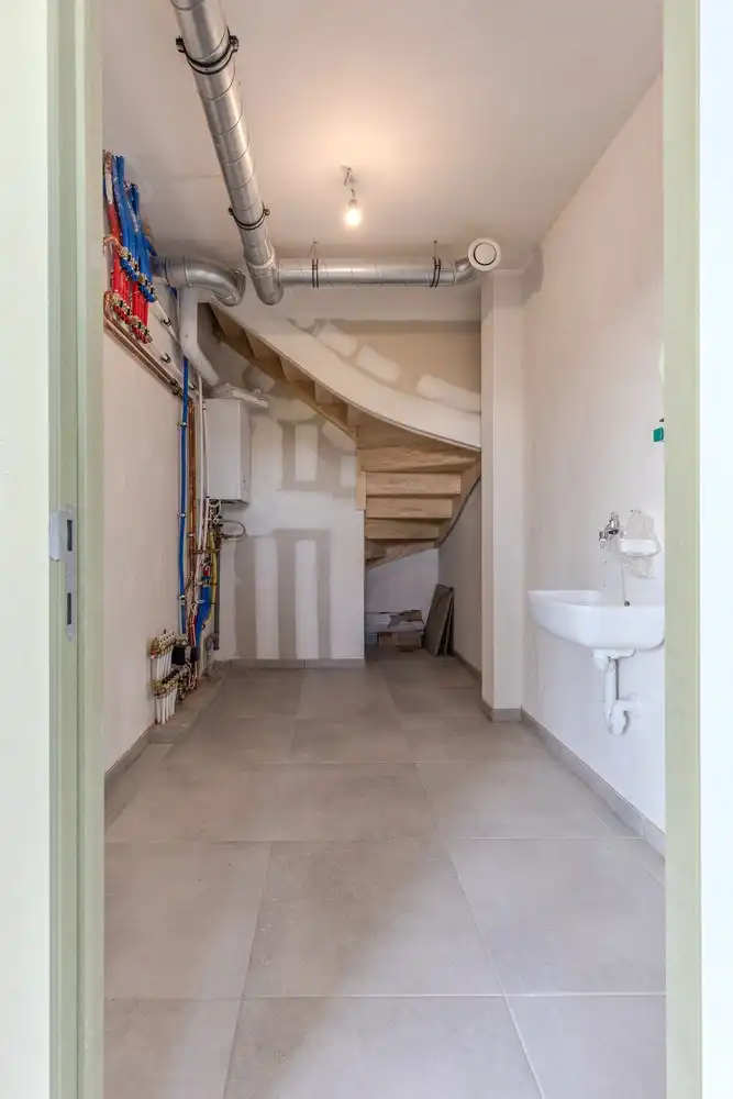 Hedendaagse nieuwbouwwoning met drie slaapkamers op rustige ligging in Neeroeteren foto 12