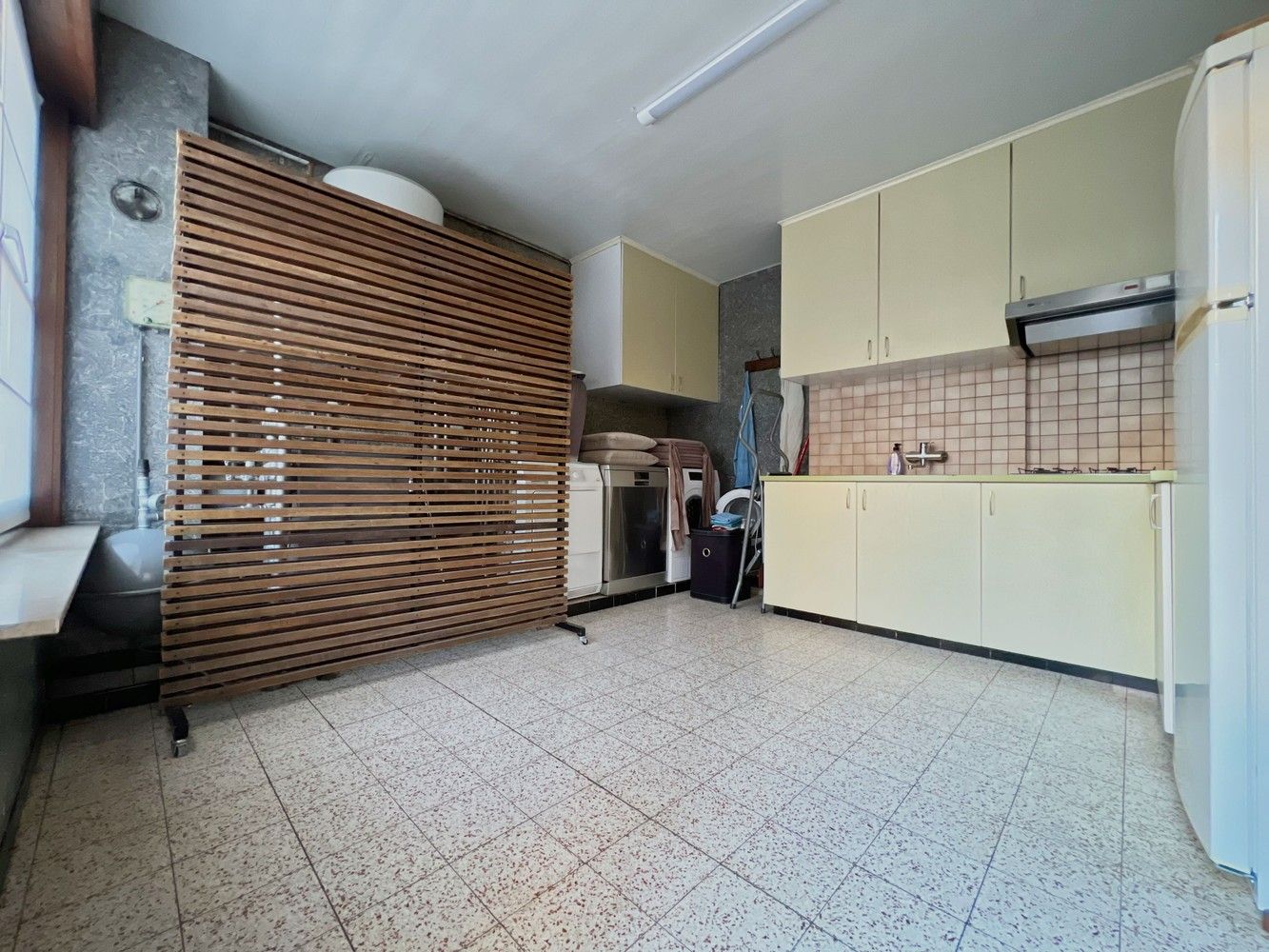 Topper! Stijlvolle woning met zonnige tuin + 2x garage foto 9