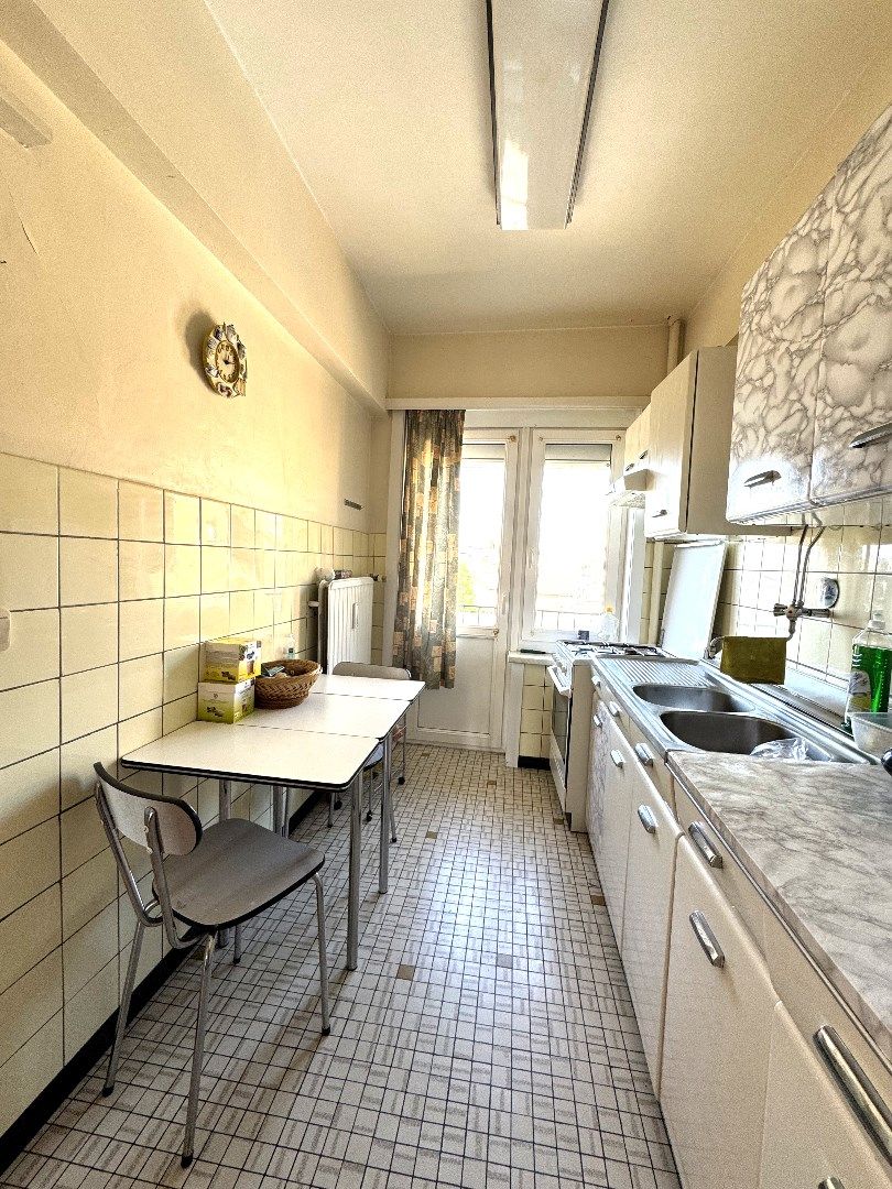 Ruim appartement met veel potentieel op toplocatie in Vilvoorde. foto 13