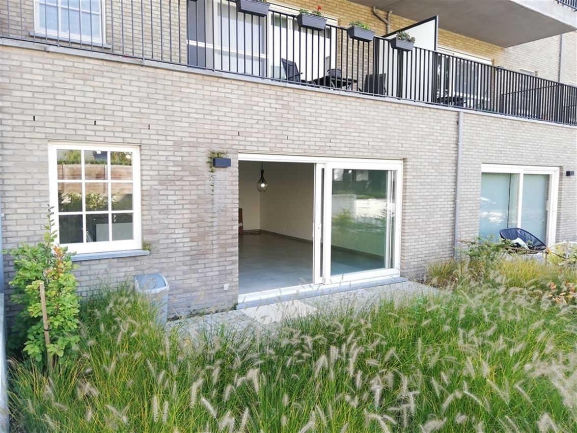 Gelijkvloers appartement met 2 slpk., terras en garage foto 2