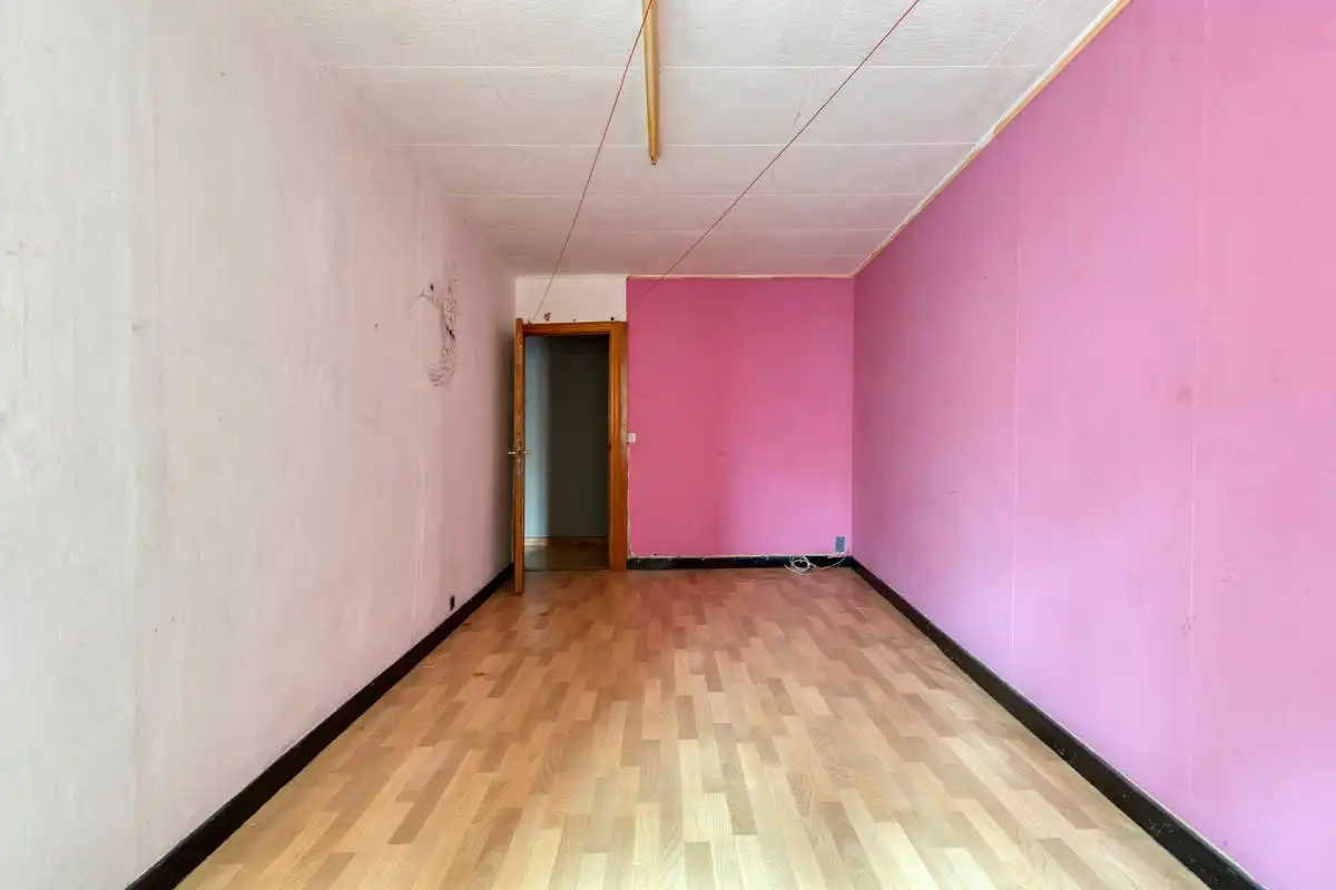Opbrengsteigendom met renovatiepotentieel op toplocatie in Kortrijk foto 16