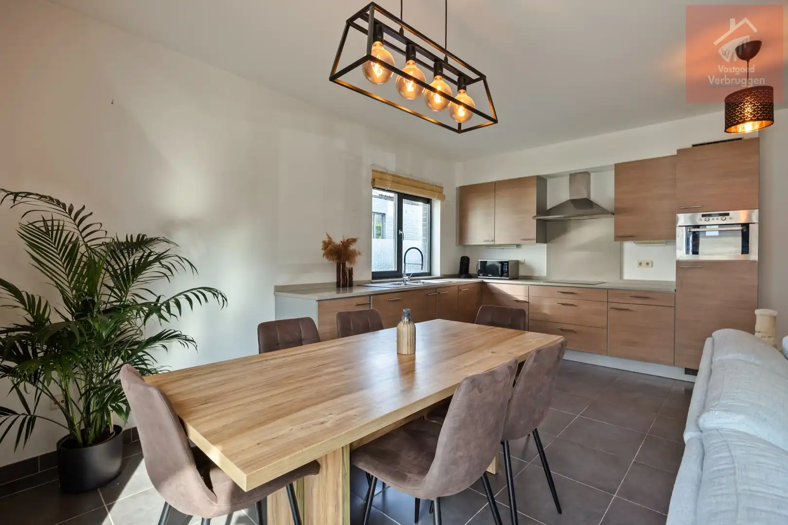 Modern instapklaar gelijkvloers appartement met 2 slpk, terrassen en autostaanplaats foto 5