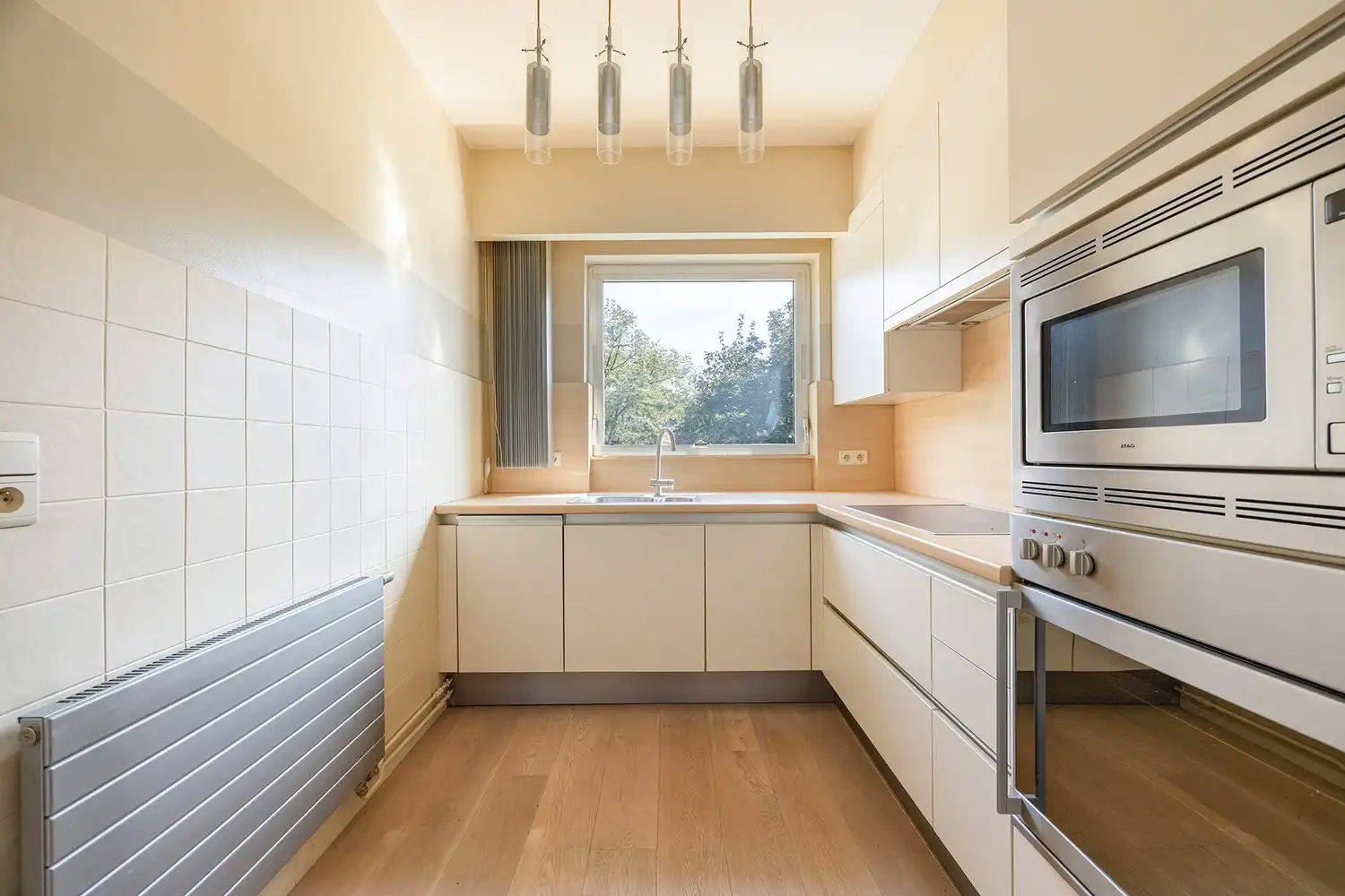 Verzorgd 3-slaapkamer appartement met garagebox foto 5