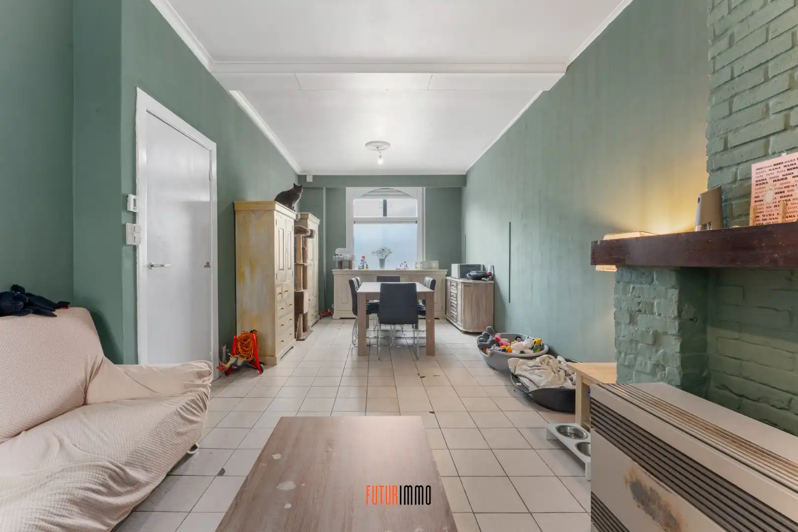 Te renoveren rijwoning met goeie ligging foto 4