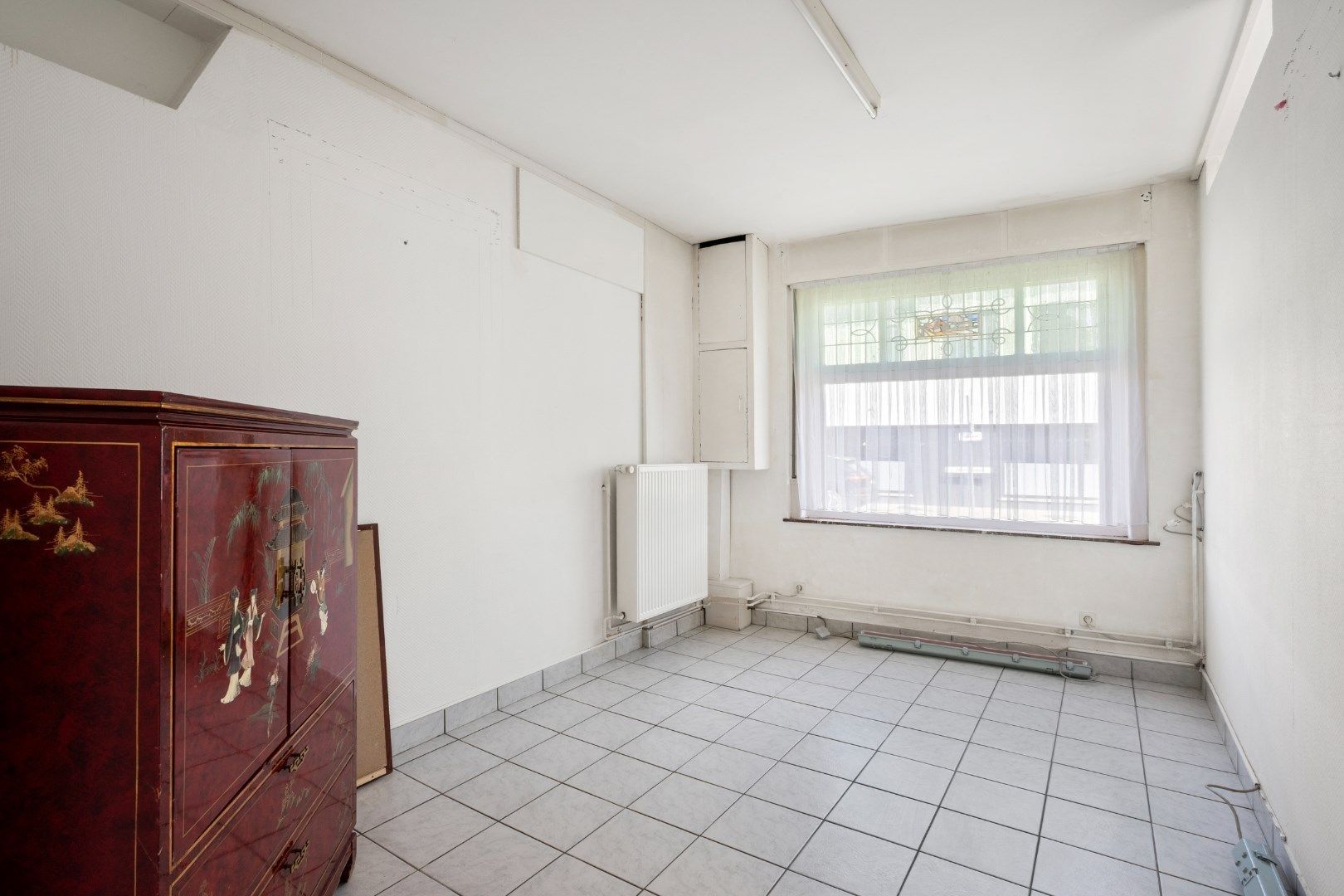 Te renoveren hoekwoning op strategische ligging foto 6