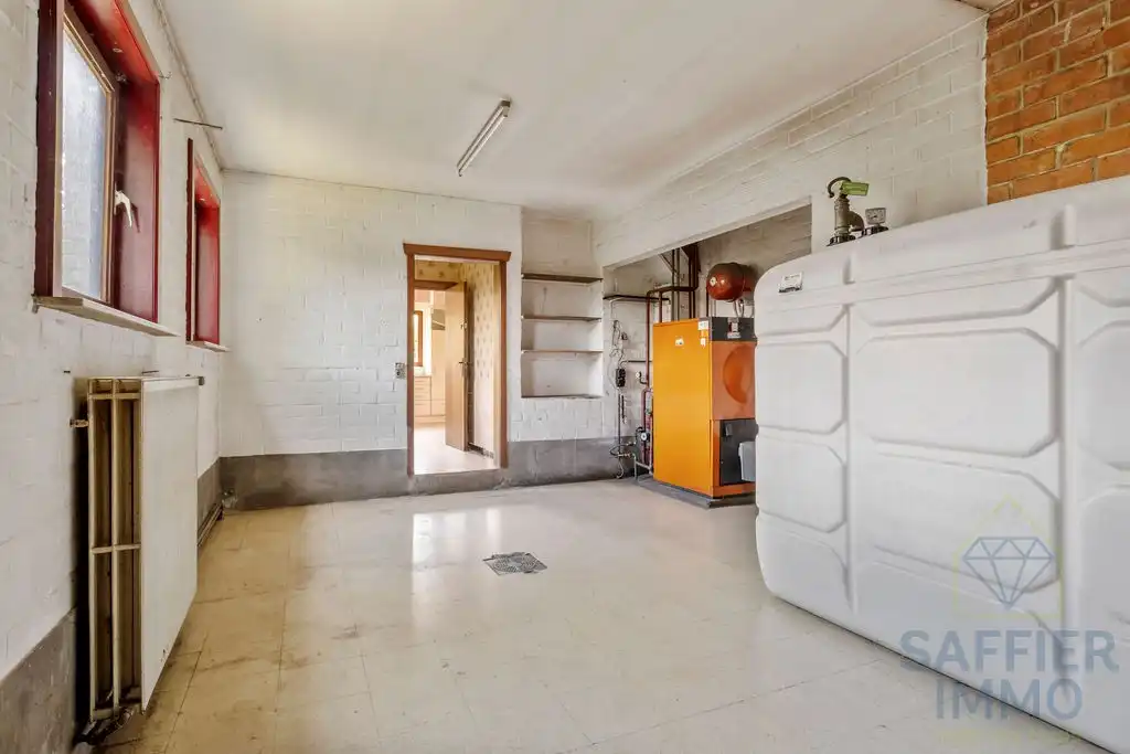 Ruime gezinswoning met zonnige tuin en 5 slaapkamers in hartje Izegem foto 23