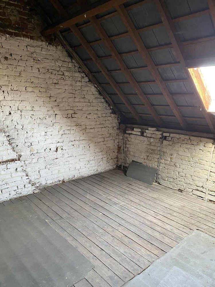 Te renoveren rijwoning met tuin en garage – centraal gelegen met veel potentieel! foto 12