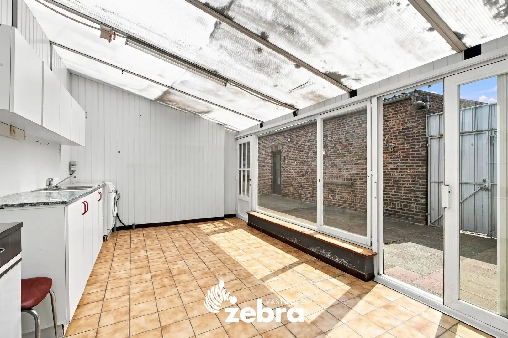 Halfopen woning in tuinwijk te koop in Roeselare! foto 10