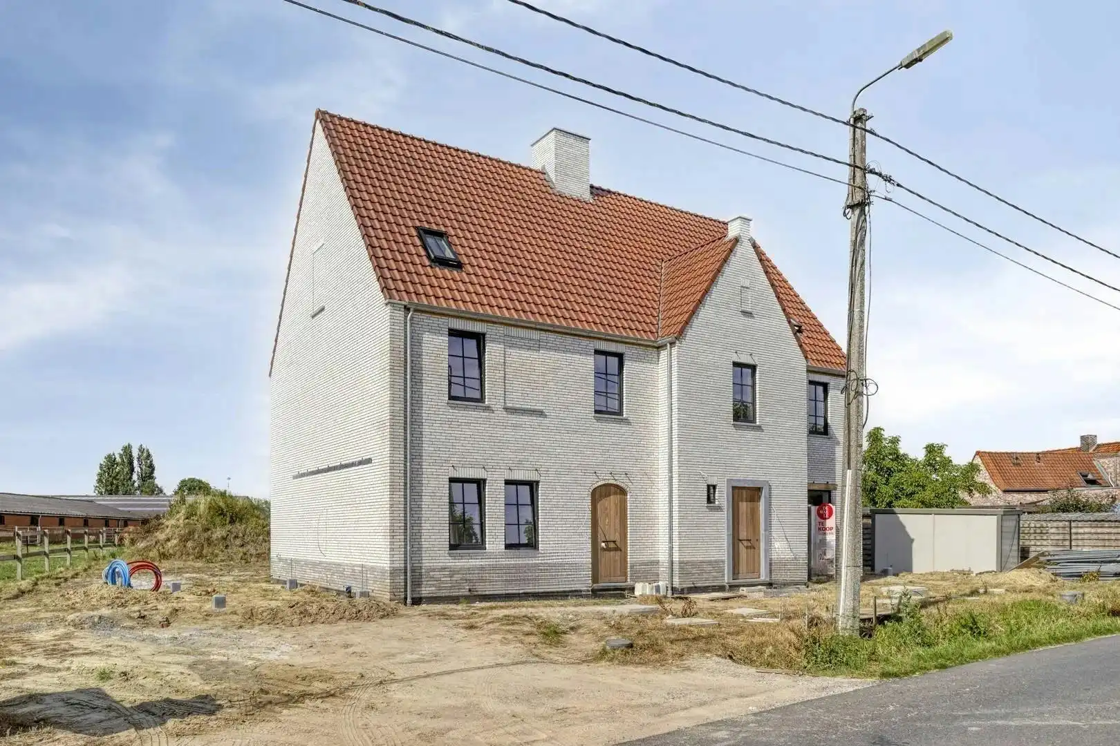 Landelijke nieuwbouwwoning met 3 kamers te koop in Avelgem foto {{pictureIndex}}