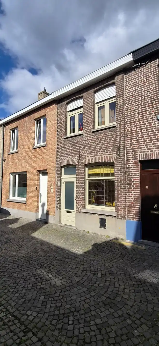 Brugge: te vernieuwen woning met garage foto 3