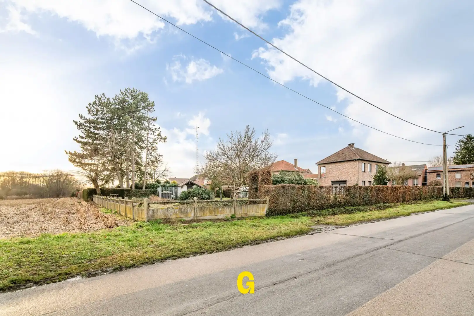 Perceel bouwgrond voor open bebouwing op 9 are, grenzend aan landbouwzone foto 6