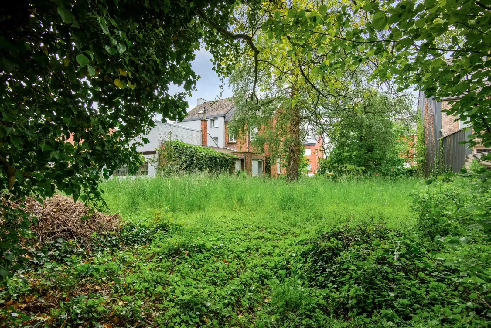 Te renoveren woning met bouwgrond en veel potentieel op rustige ligging in Puurs-Sint-Amands! foto 6