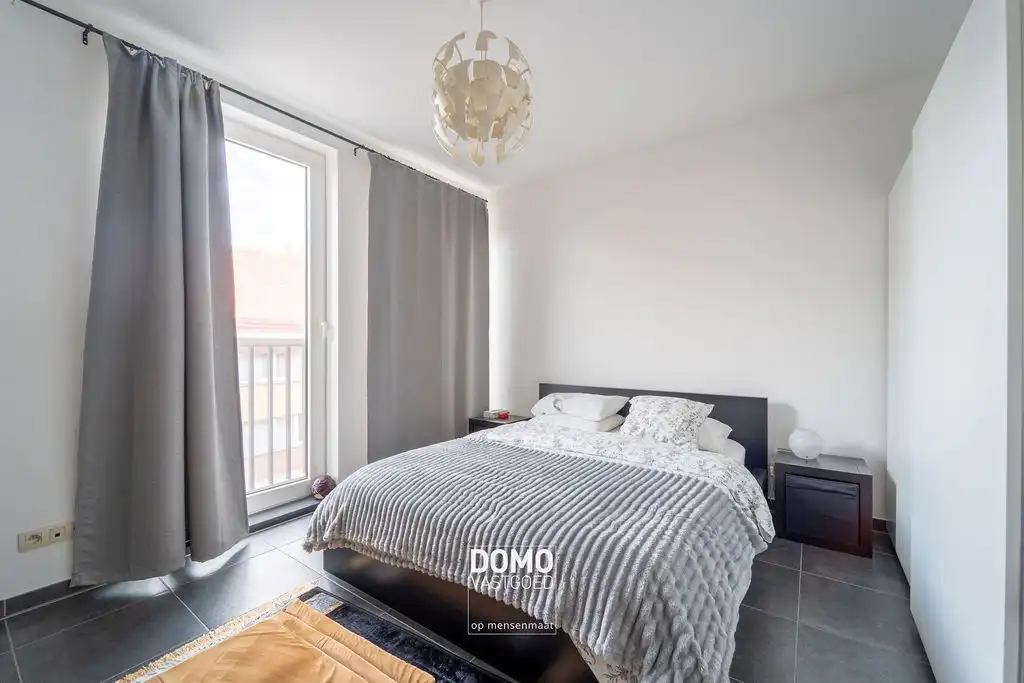 Instapklaar en lichtrijk 2-slaapkamerappartement met zonnig terras en parking in Diepenbeek foto 7