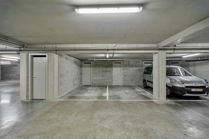 Gelijkvloers appartement met terras en tuintje foto 20