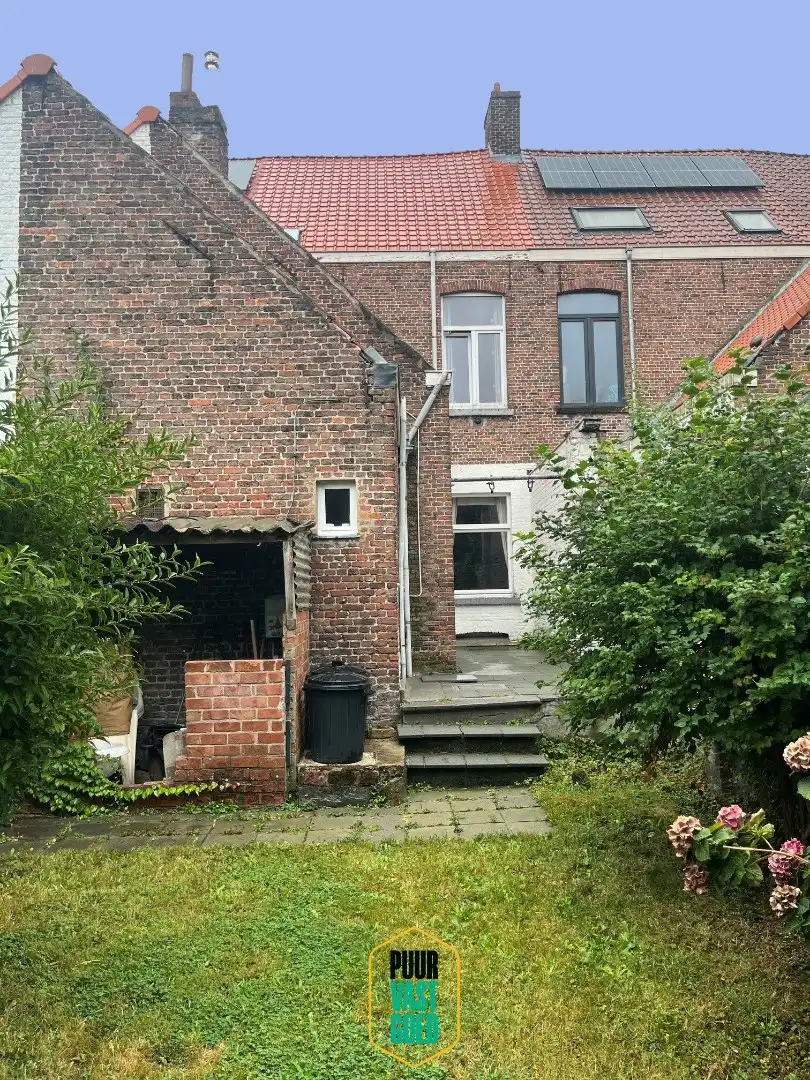 Op te knappen belle-époque woning met 'ziel' en een heel toffe tuin foto 20
