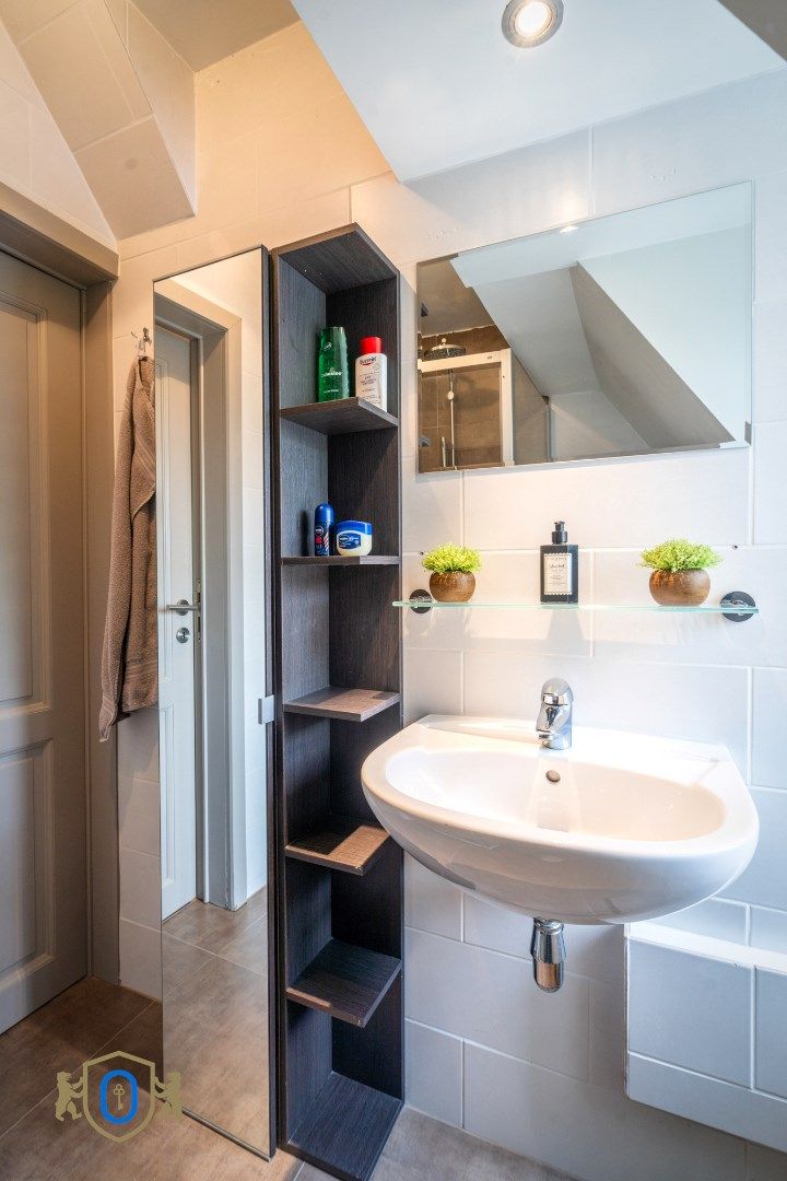Charmante tussenwoning met tuin foto 19