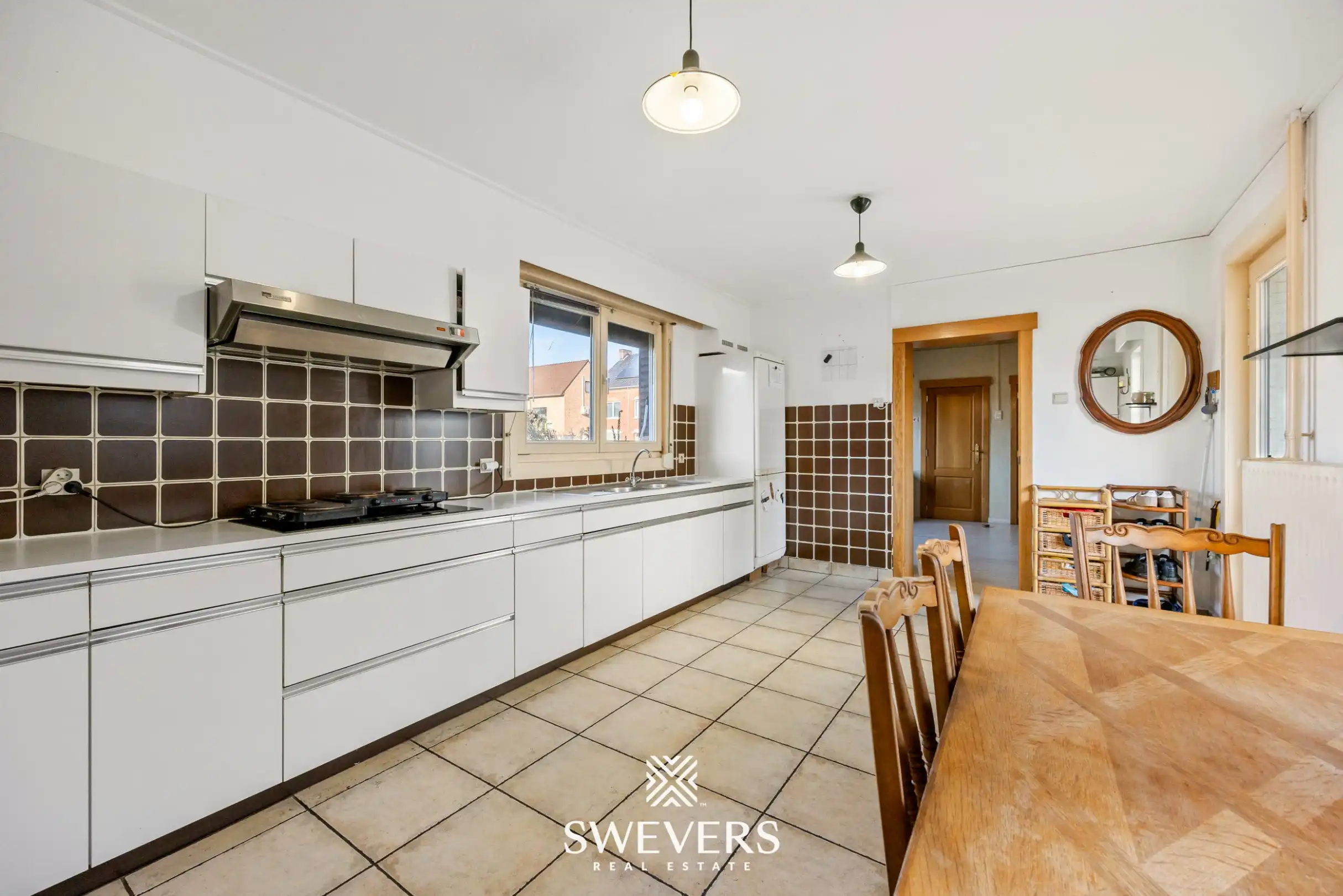 Te renoveren open bebouwing met ruime volumes en zuidgericht perceel in Heusden   foto 11